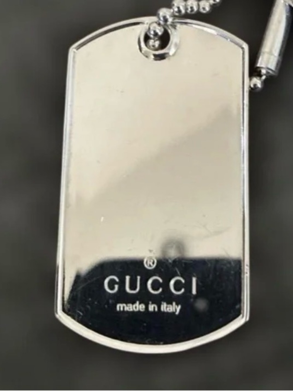 Gucci, Sterling, silver 925 dog tag with silver ball chain 22 inches long.